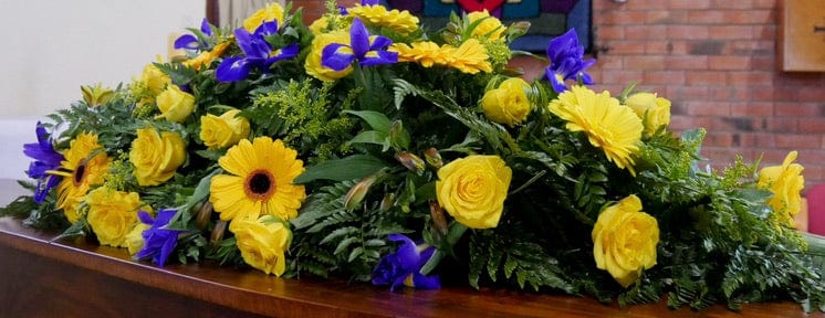 Casket Wreath With Yellows & Blues - Strelitzia's Floristry & Irish Craft Shop
